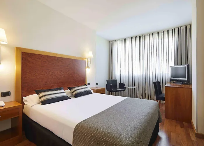 Exe Plaza Delicias Отель