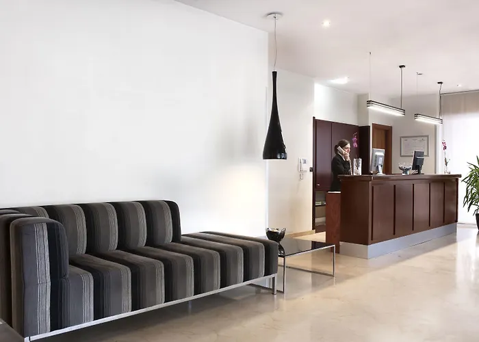 Exe Plaza Delicias Отель