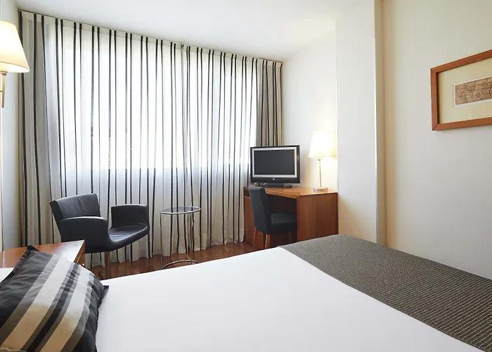 ホテル Exe Plaza Delicias 3*